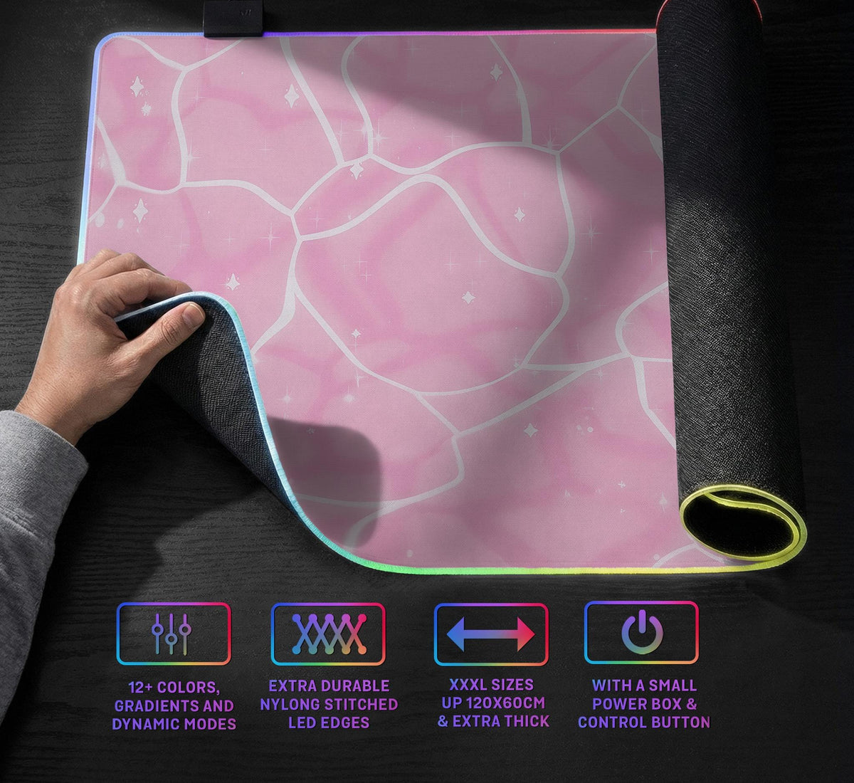 Pastel pink desk mat with a marble-style design, white flowing lines, and small sparkle accents.