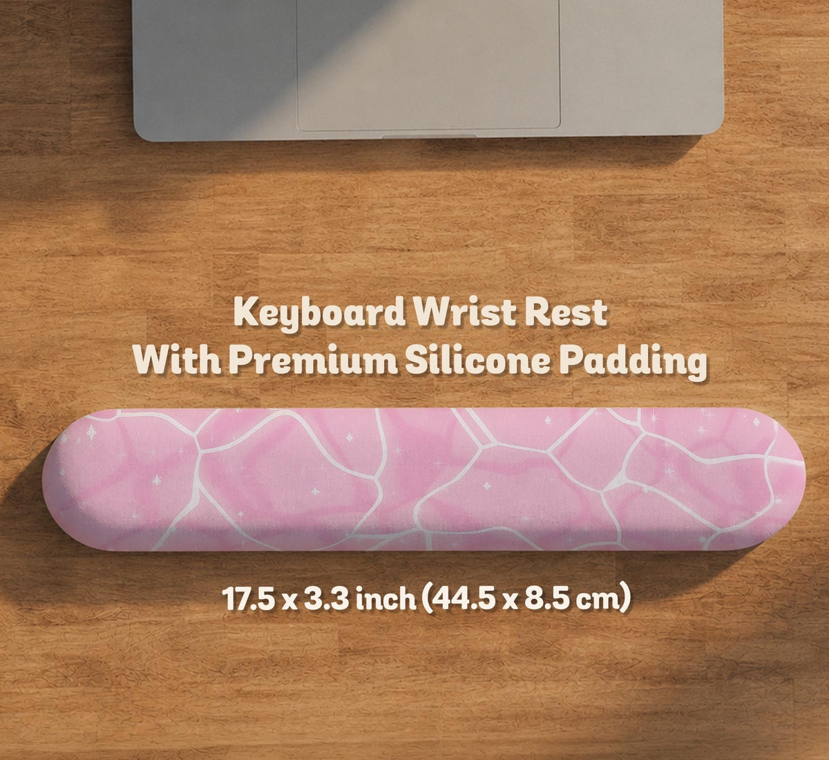 Pastel pink desk mat with a marble-style design, white flowing lines, and small sparkle accents.