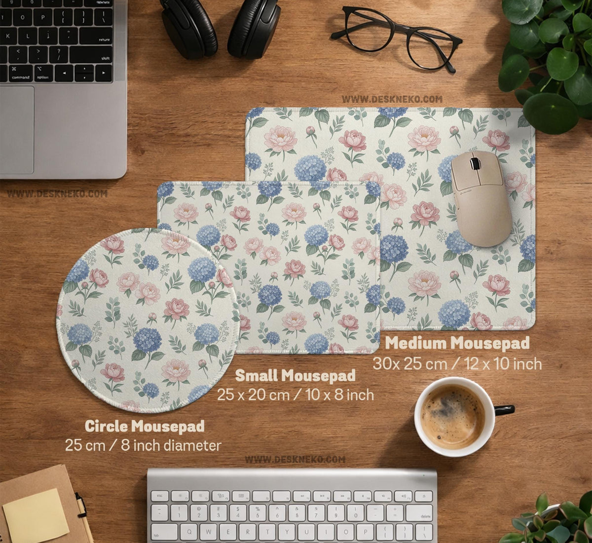 Floral desk mat with sage greenery, pink peonies, blue flowers, and a warm cream background.