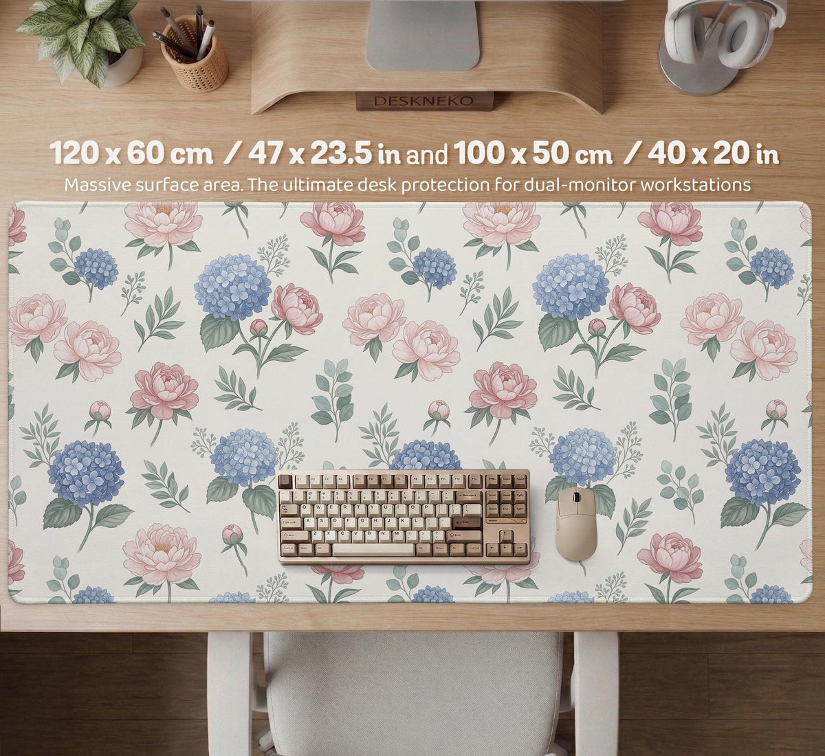 Floral desk mat with sage greenery, pink peonies, blue flowers, and a warm cream background.