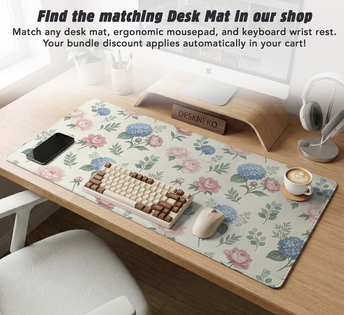 Mousepad and keyboard wrist rest with a floral print of blue hydrangeas, pink peonies, sage leaves, and a cream background.