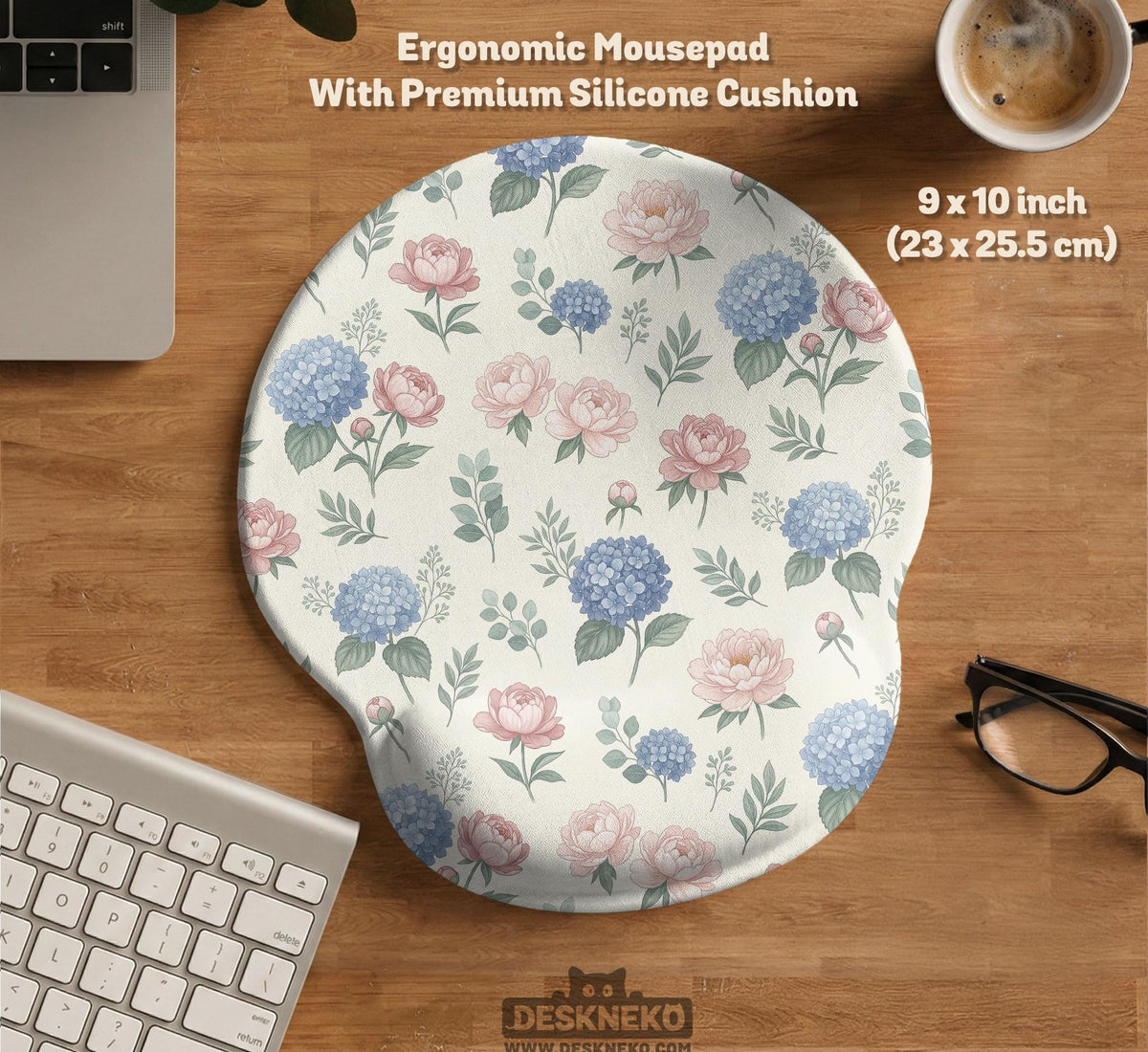 Mousepad and keyboard wrist rest with a floral print of blue hydrangeas, pink peonies, sage leaves, and a cream background.
