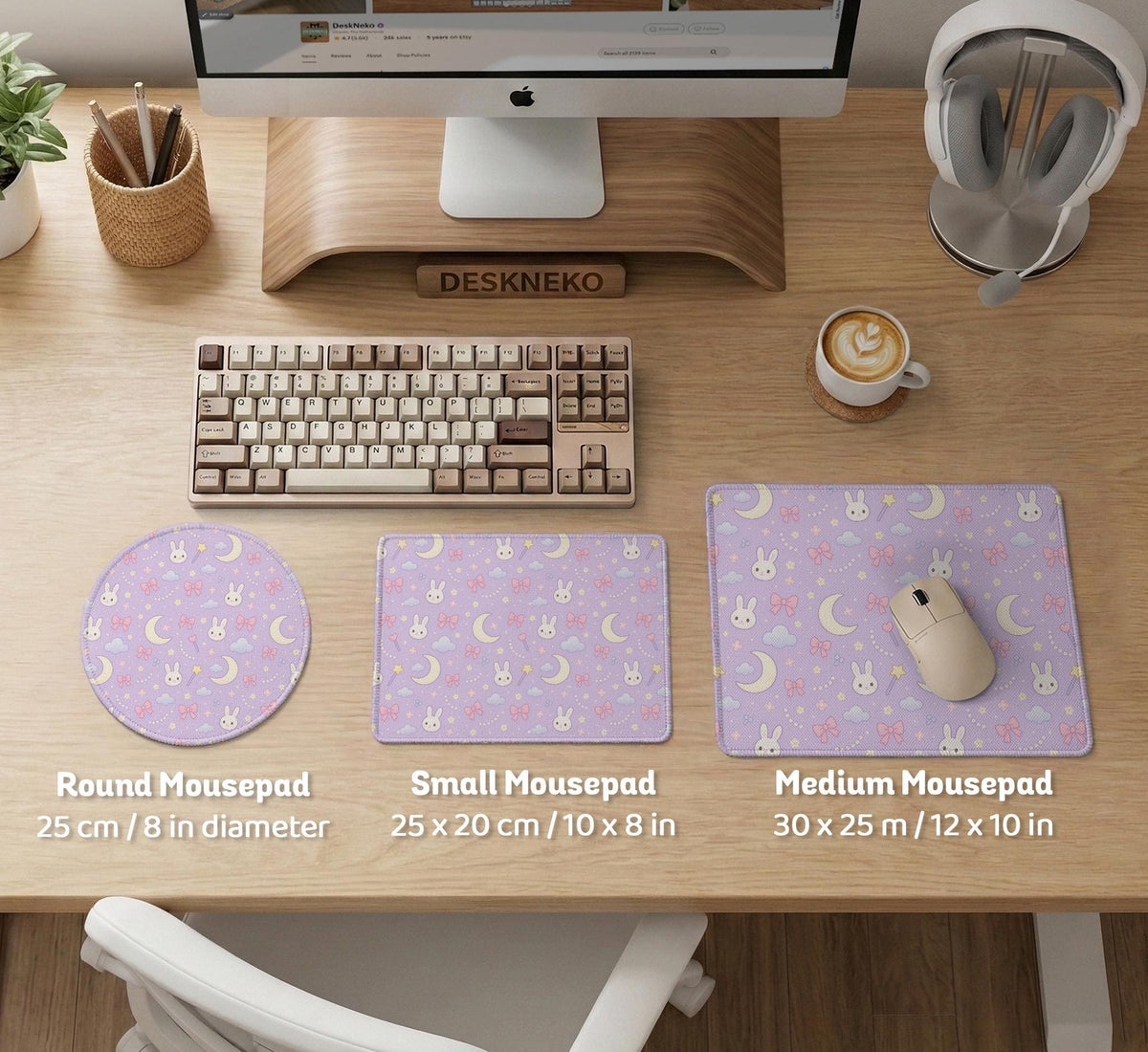 Lavender desk mat with an all-over pattern of bunny faces, clouds, moons, bows, and flowers in pastel colors.