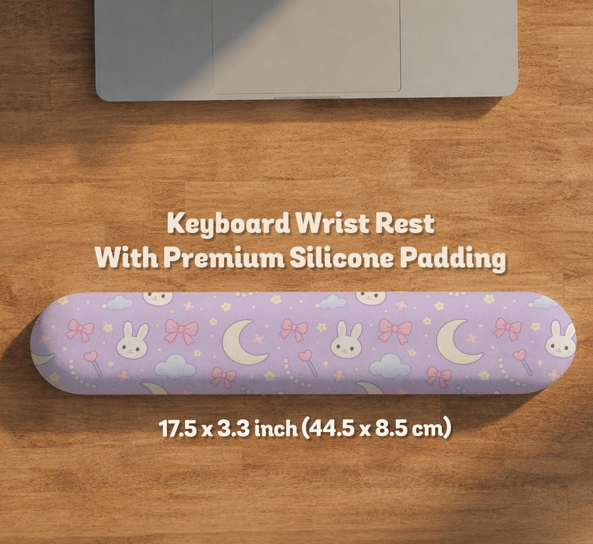 Pastel lavender desk mat with an all-over pattern of bunnies, crescent moons, clouds, bows, stars, and small flowers.