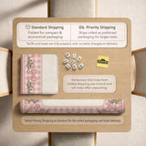 Square pink mahjong mat with a gingham border, floral corner details, and ribbon accents on a light background.