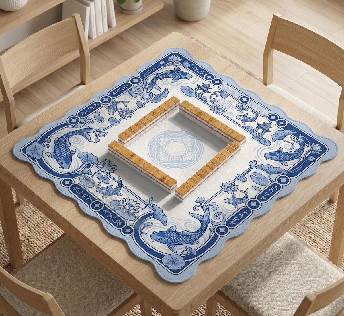 Blue and white square mahjong mat with a koi fish and lotus border design and a plain center area.