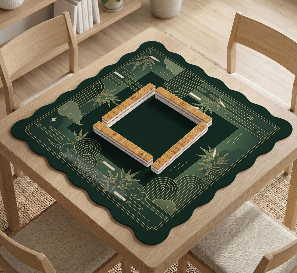Square emerald green mahjong mat with bamboo line art, gold geometric cloud shapes, and a plain center playing area.