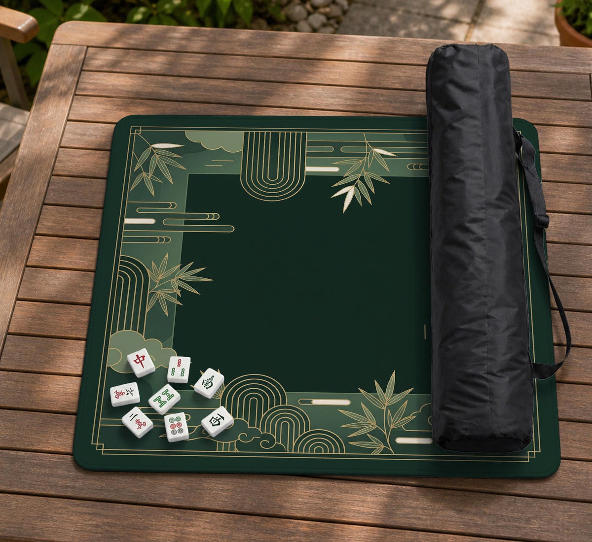 Square emerald green mahjong mat with bamboo line art, gold geometric cloud shapes, and a plain center playing area.