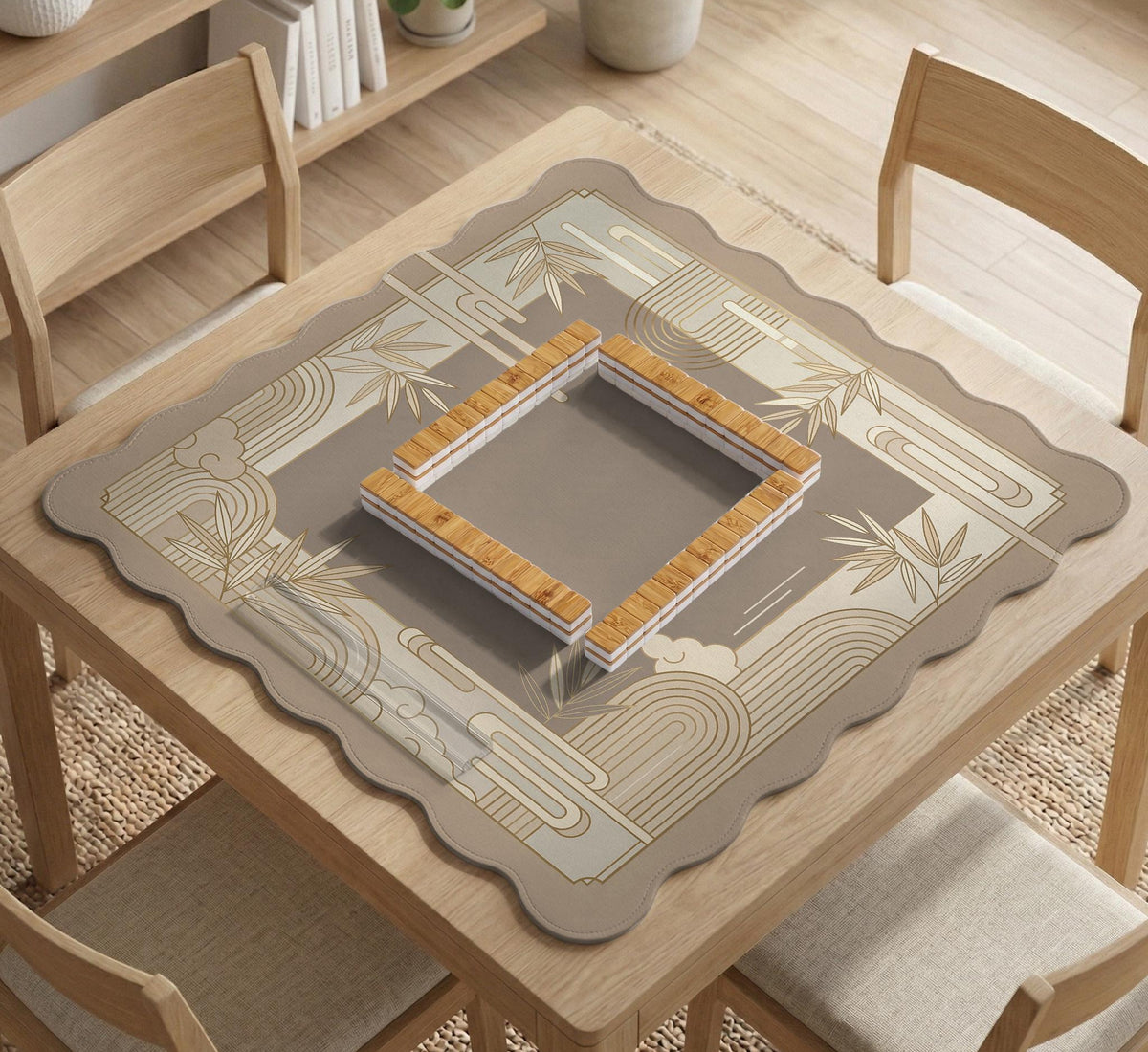 Beige and gold square mahjong mat with a bamboo pattern and geometric border.