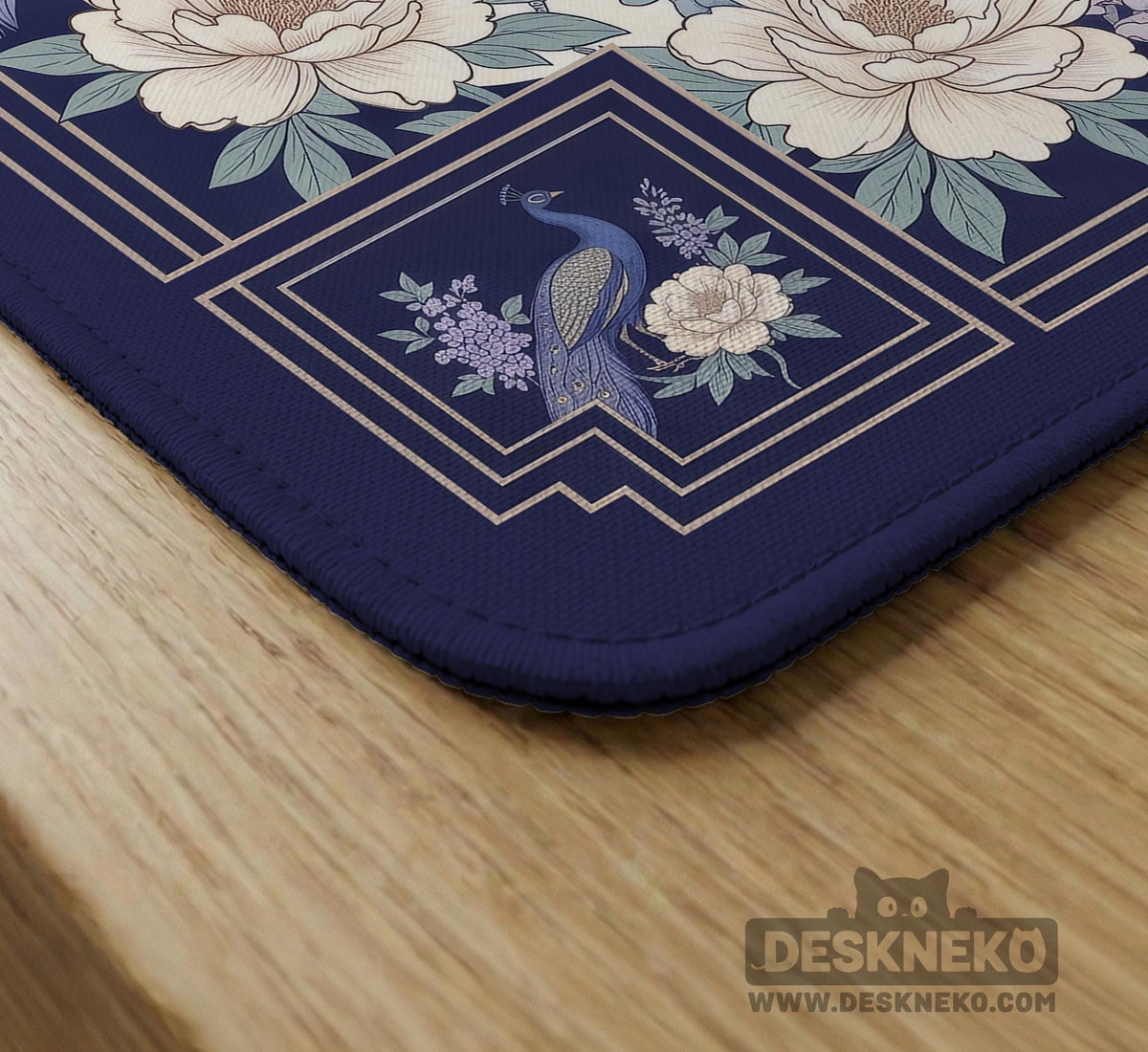 Blue mahjong table mat with a peacock and floral border, ivory center, lavender flowers, and scalloped edges.