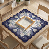 Blue mahjong mat with a floral peacock border and an open center area for tile play.