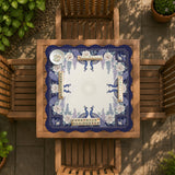 Blue mahjong mat with a floral peacock border and an open center area for tile play.