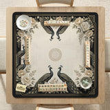 Square ivory mahjong mat with a black peacock border, cream flowers, and gold accent details.