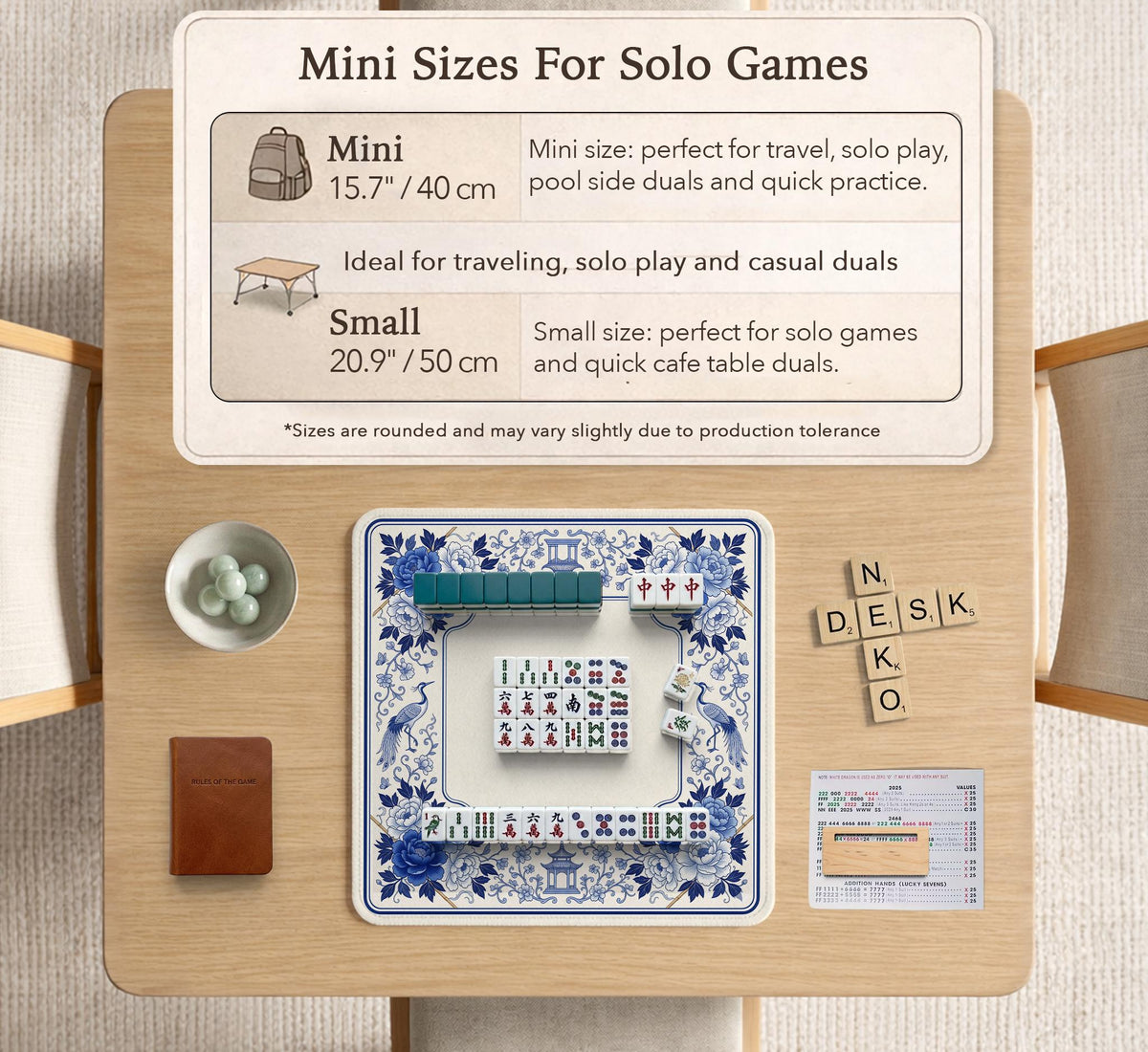 Square blue and white mahjong mat with peonies, cranes, pagoda accents, and chinoiserie linework around a plain center.
