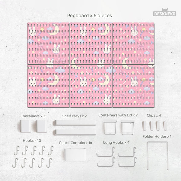 Pink pegboard panels with a kawaii bunny, cloud, moon, bow, and star pattern shown as a wall organizer set.