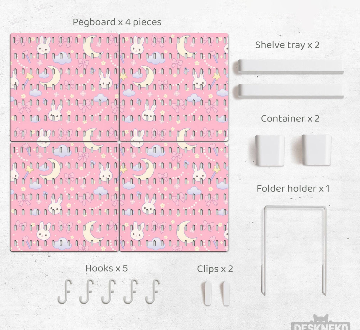 Pink pegboard panels with a kawaii bunny, cloud, moon, bow, and star pattern shown as a wall organizer set.