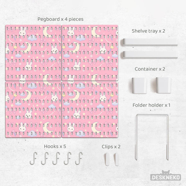 Pink pegboard panels with a kawaii bunny, cloud, moon, bow, and star pattern shown as a wall organizer set.