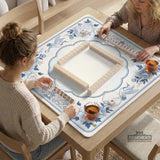 Square mahjong mat with a blue chinoiserie floral pattern on a light background.