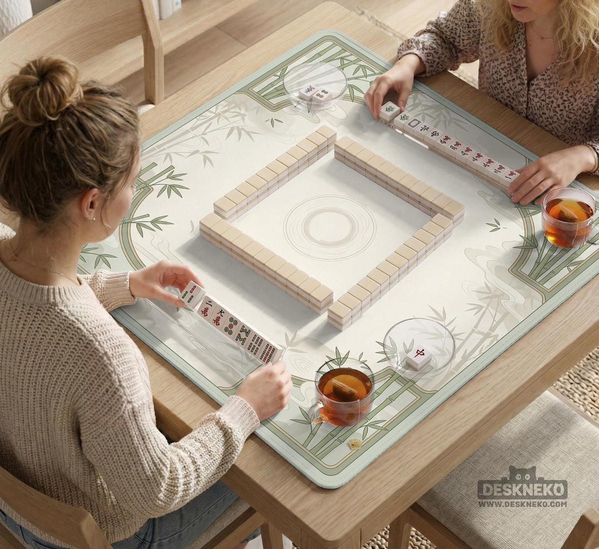 Square light green mahjong mat with bamboo stalks, soft ivory details, botanical shadows, mist lines, and a circular center design.