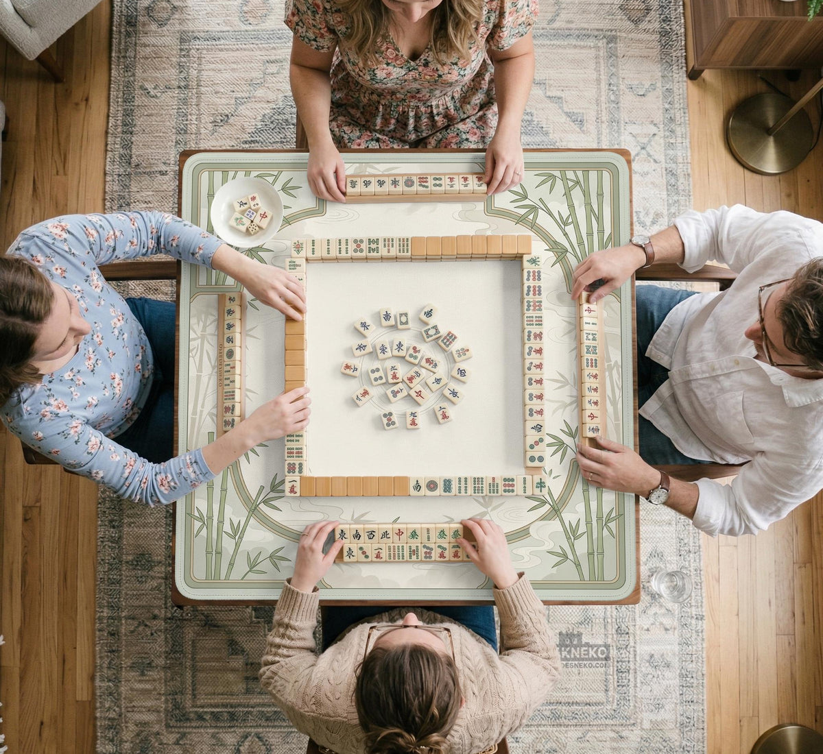 Square light green mahjong mat with bamboo stalks, soft ivory details, botanical shadows, mist lines, and a circular center design.