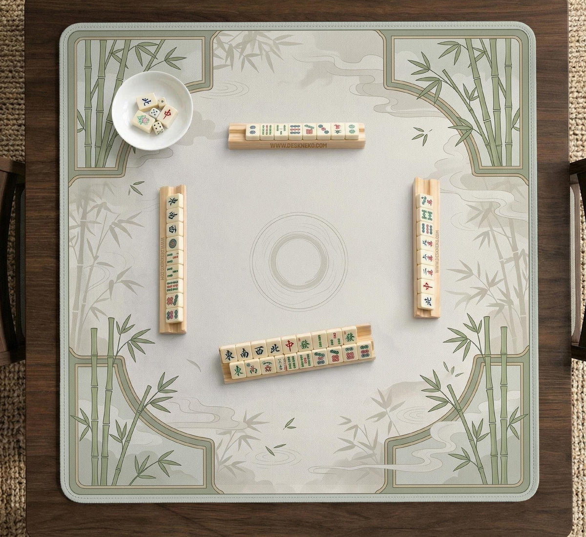 Square light green mahjong mat with bamboo stalks, soft ivory details, botanical shadows, mist lines, and a circular center design.