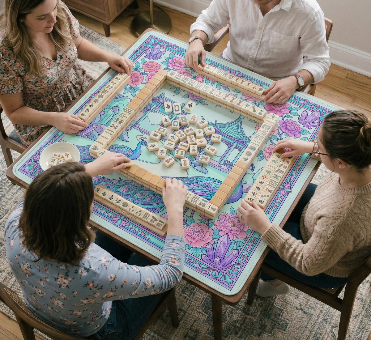 Pastel aqua mahjong table mat with peacock birds, pink flowers, pavilion details, and ornate floral linework.