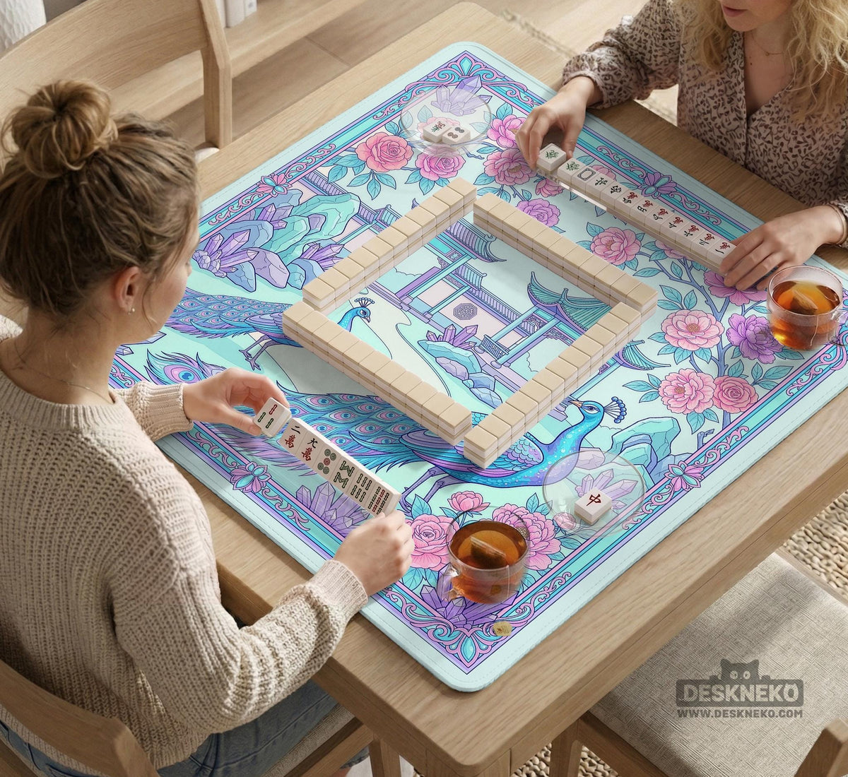 Pastel aqua mahjong table mat with peacock birds, pink flowers, pavilion details, and ornate floral linework.