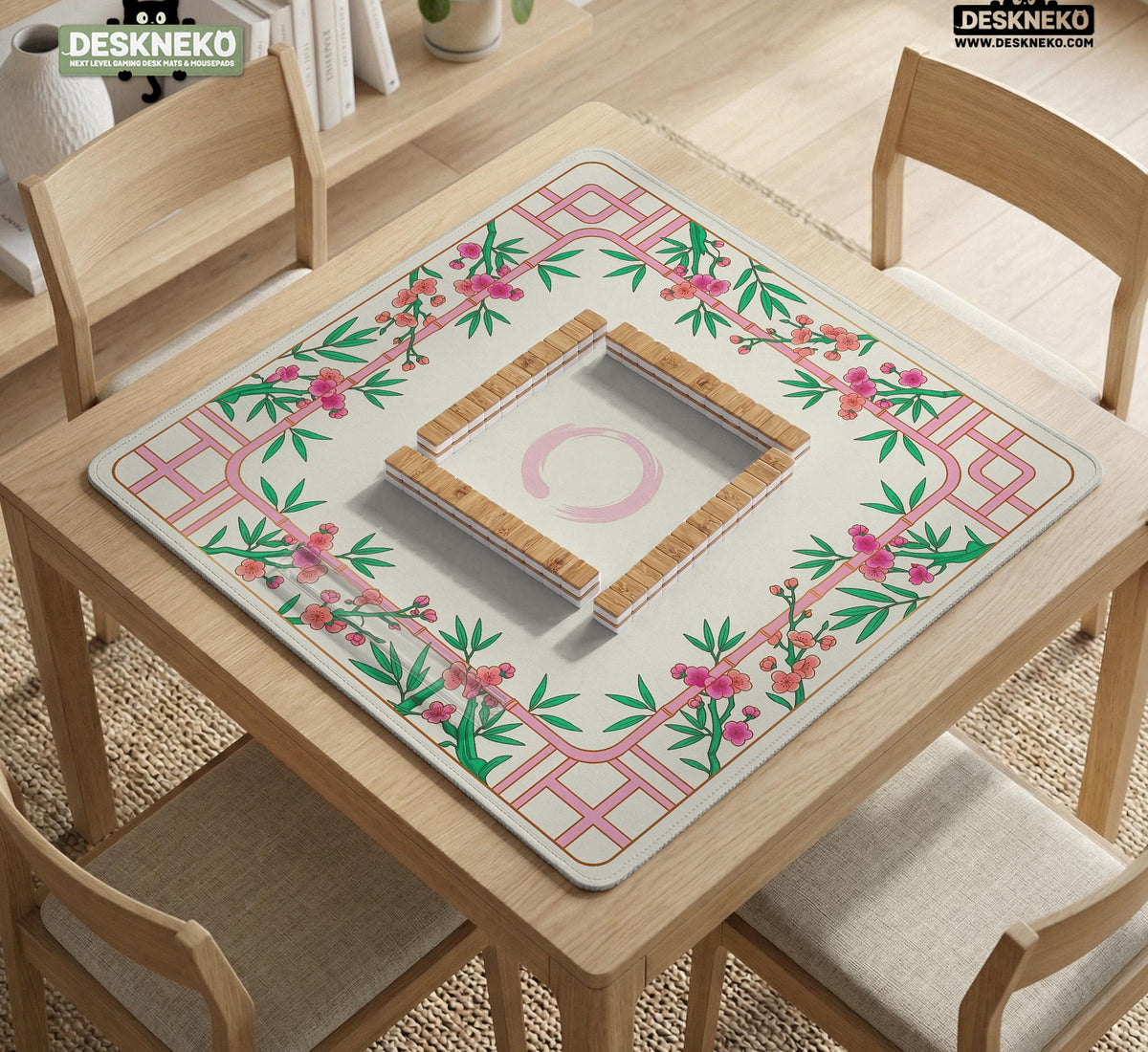 Pink cherry blossom floral mahjong table mat with a cream center and bamboo-style border design.