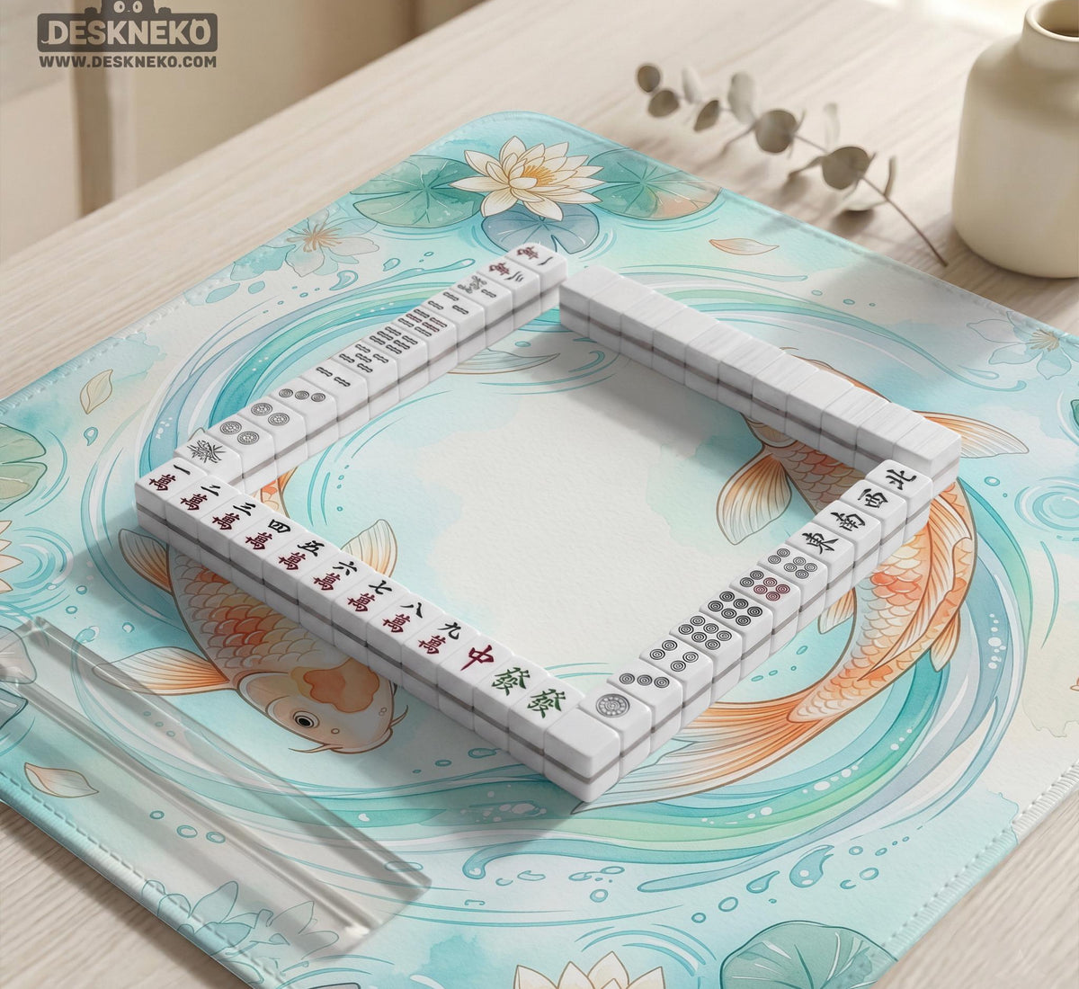 Pastel aqua square mahjong mat with orange koi fish, lotus flowers, lily pads, and flowing water lines.
