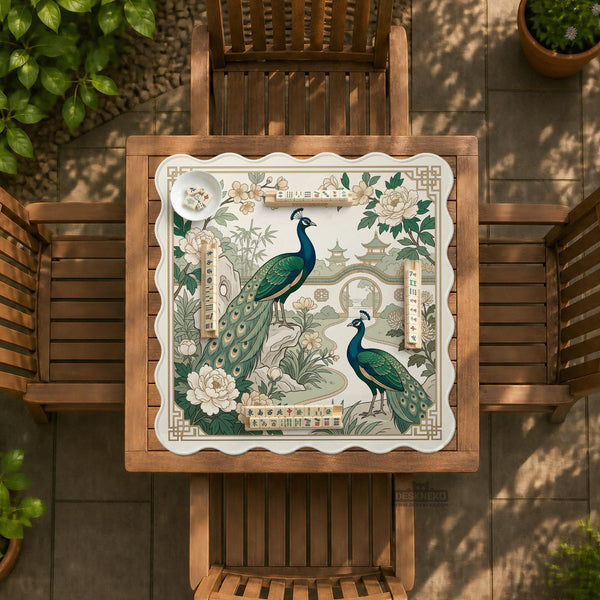A green mahjong mat with peacock, floral, bamboo, pagoda, and gold border artwork in a scalloped chinoiserie style.