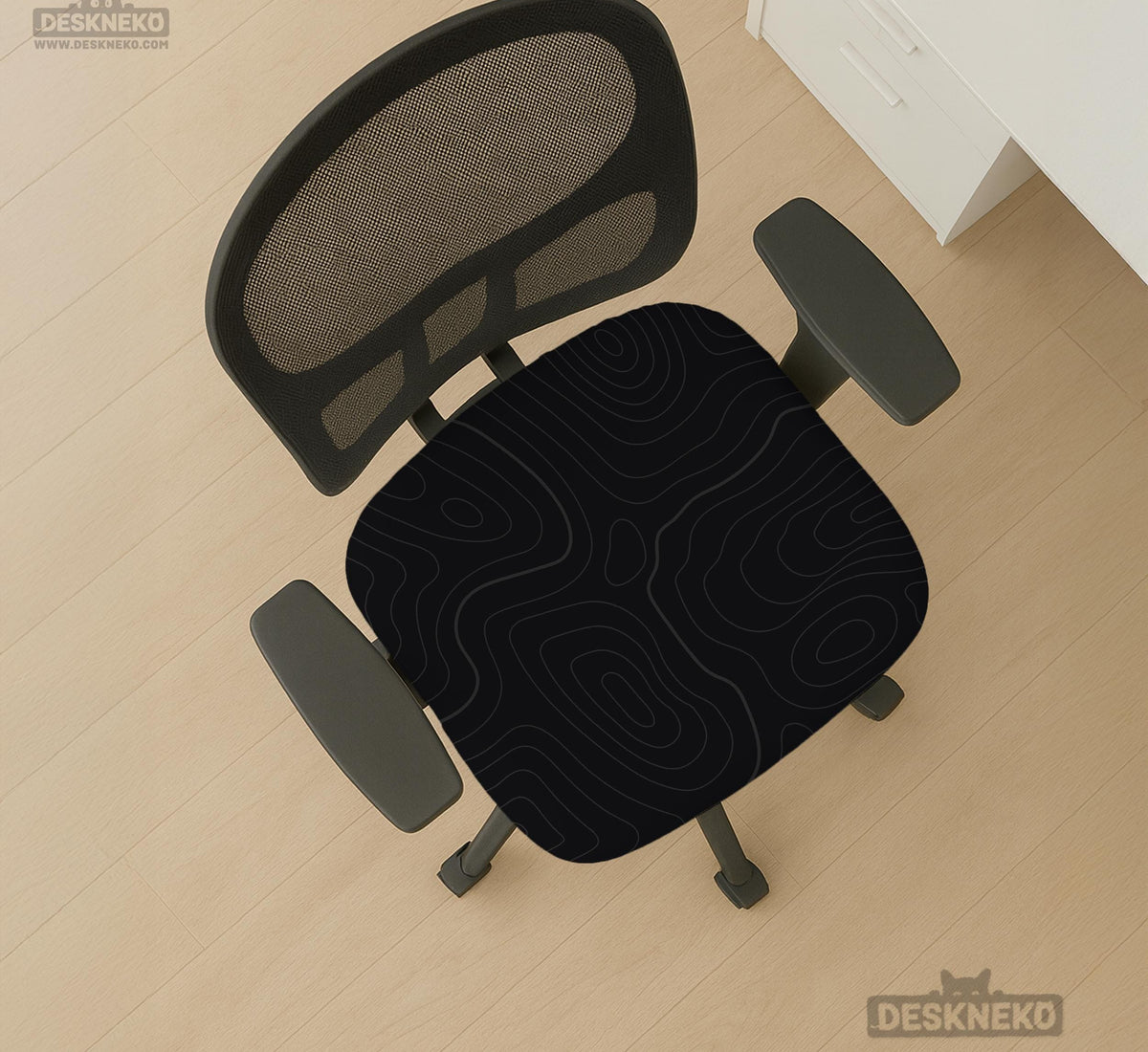 Black chair cover with a thin line art pattern on a gaming chair, shown with a high back and armrest areas covered.
