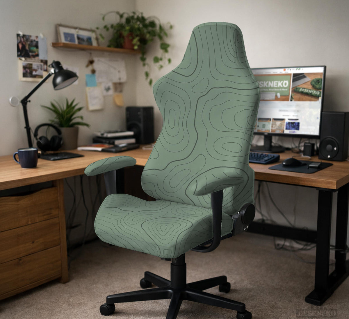 Sage green chair cover with a topographic line pattern shown on a desk chair, with armrest openings visible.