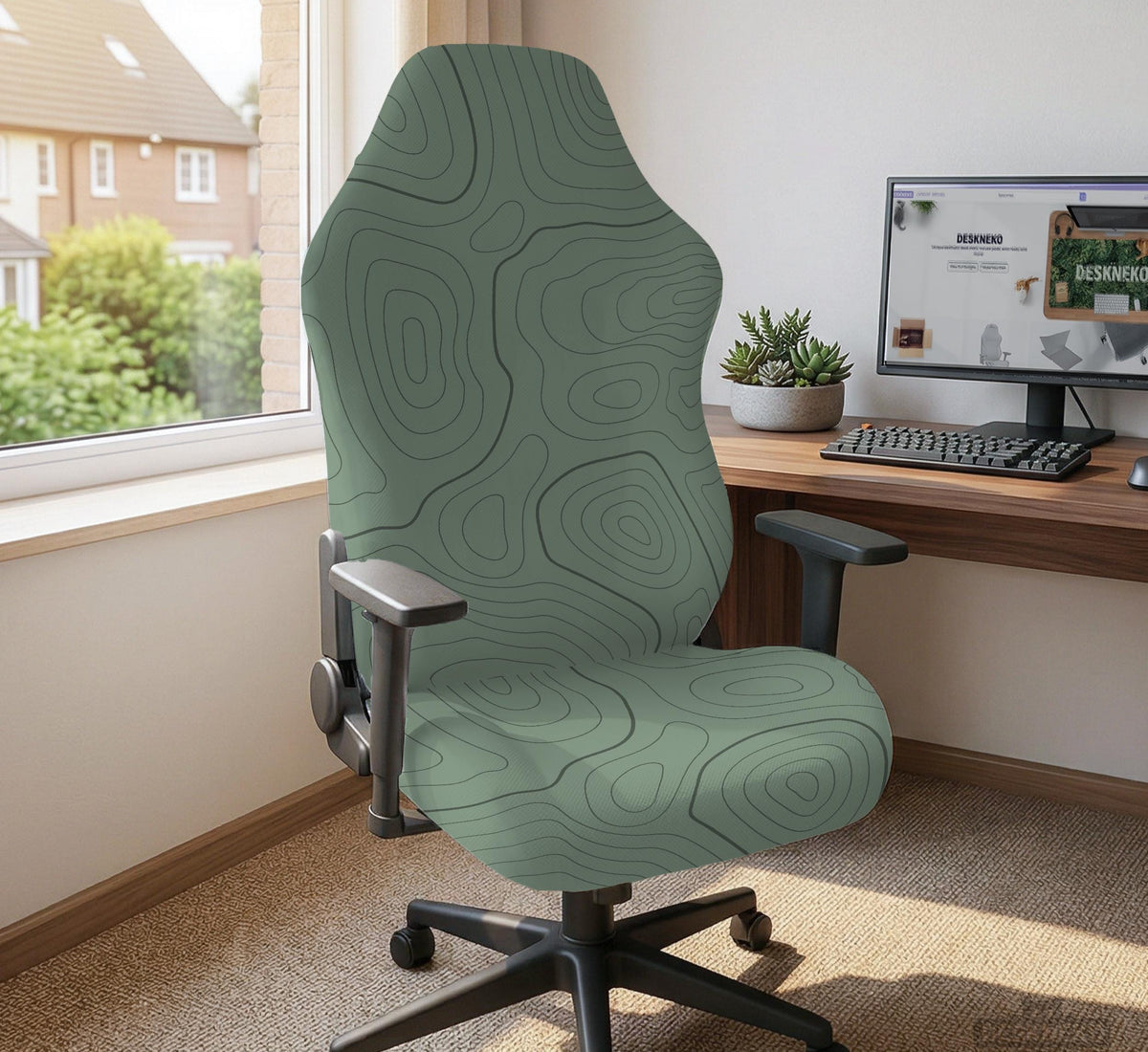 Sage green chair cover with a topographic line pattern shown on a desk chair, with armrest openings visible.