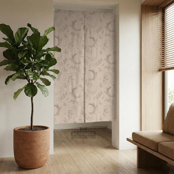 Beige door curtain with a crescent moon, leafy botanical branches, gray line art, and dotted celestial details.