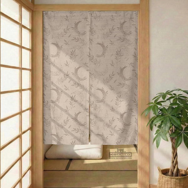 Beige door curtain with a crescent moon, leafy botanical branches, gray line art, and dotted celestial details.