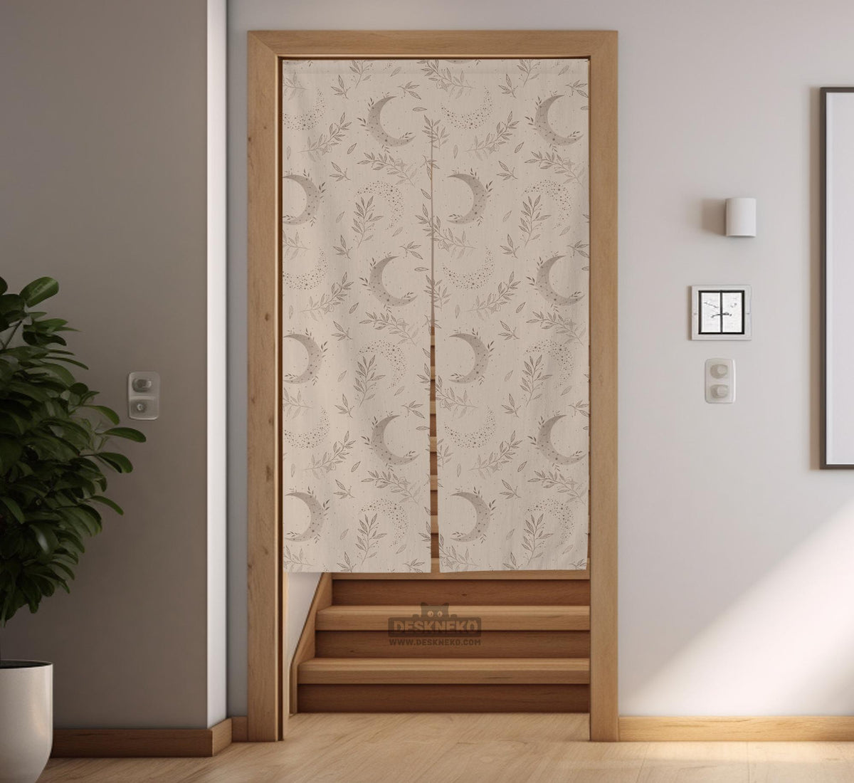 Beige door curtain with a crescent moon, leafy botanical branches, gray line art, and dotted celestial details.