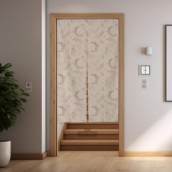Beige door curtain with a crescent moon, leafy botanical branches, gray line art, and dotted celestial details.