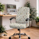 Cream chair cover with a scattered cottage garden floral print in red, blue, yellow, and green on a light background.