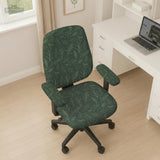 A forest green chair cover with a sage green leaf print shown on a high-back office or gaming chair.