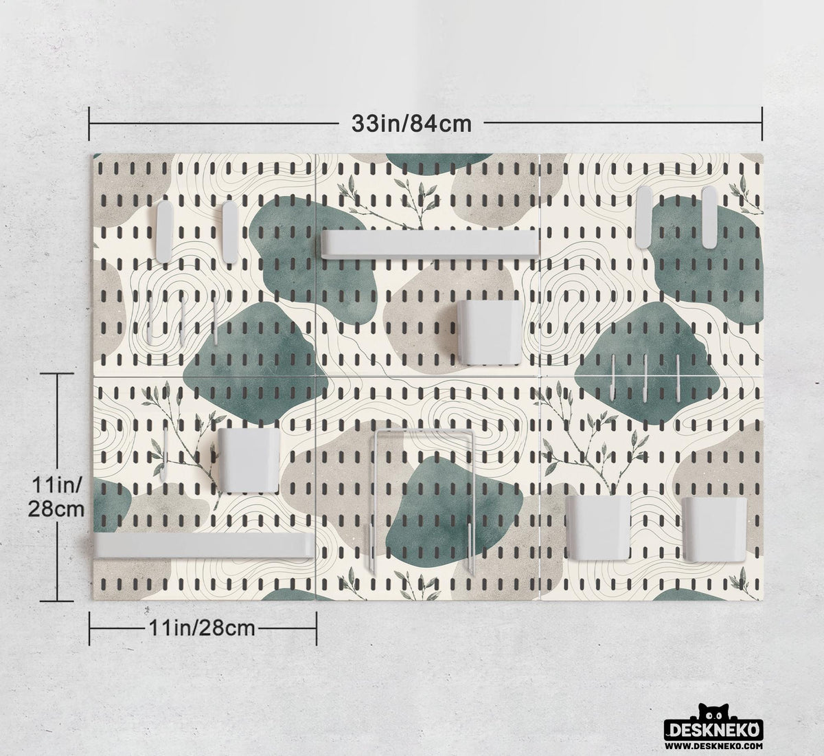 Four pegboard panels in sage green with cream, grey, teal, and leafy botanical artwork arranged in a square layout.