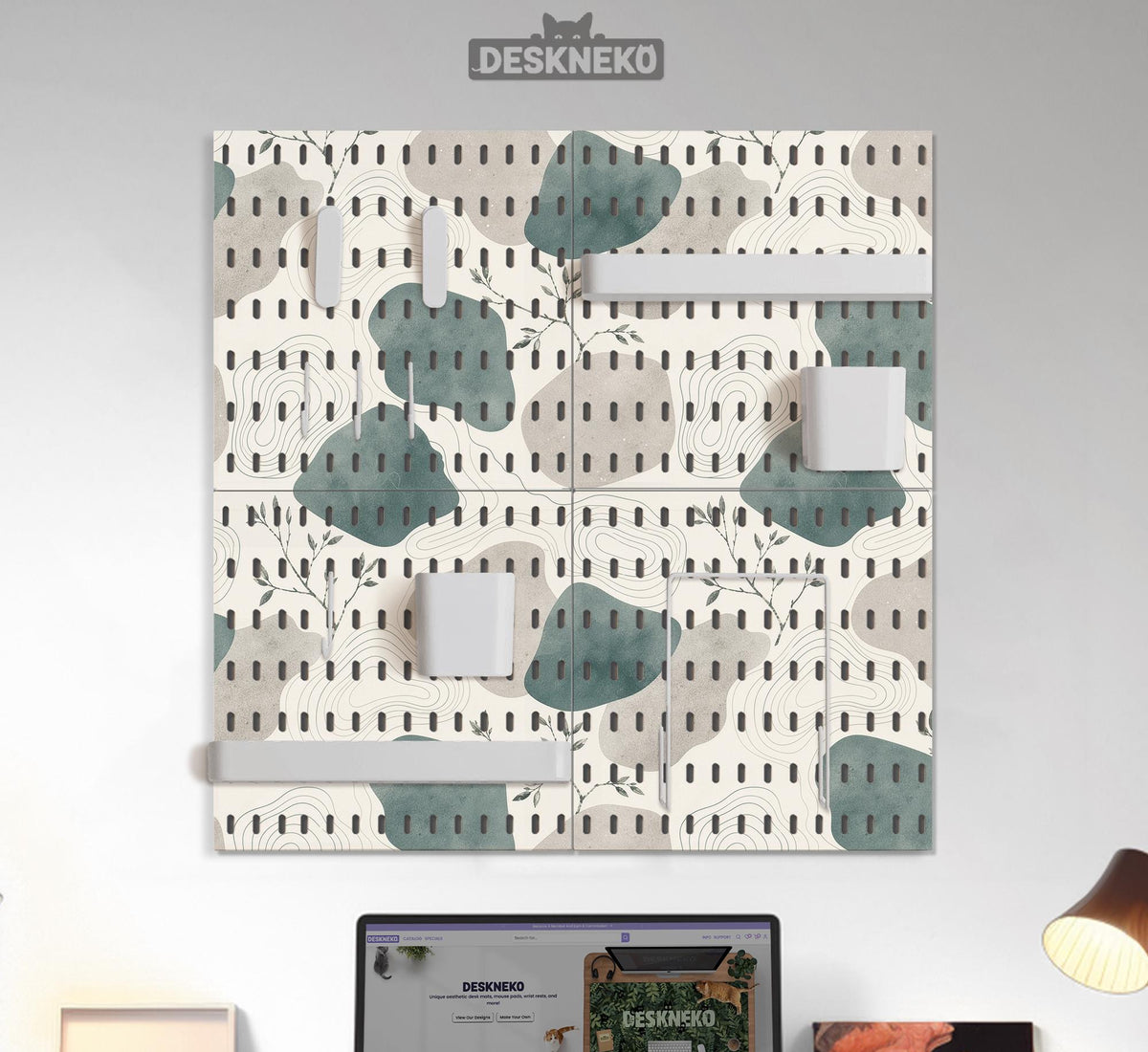 Four pegboard panels in sage green with cream, grey, teal, and leafy botanical artwork arranged in a square layout.