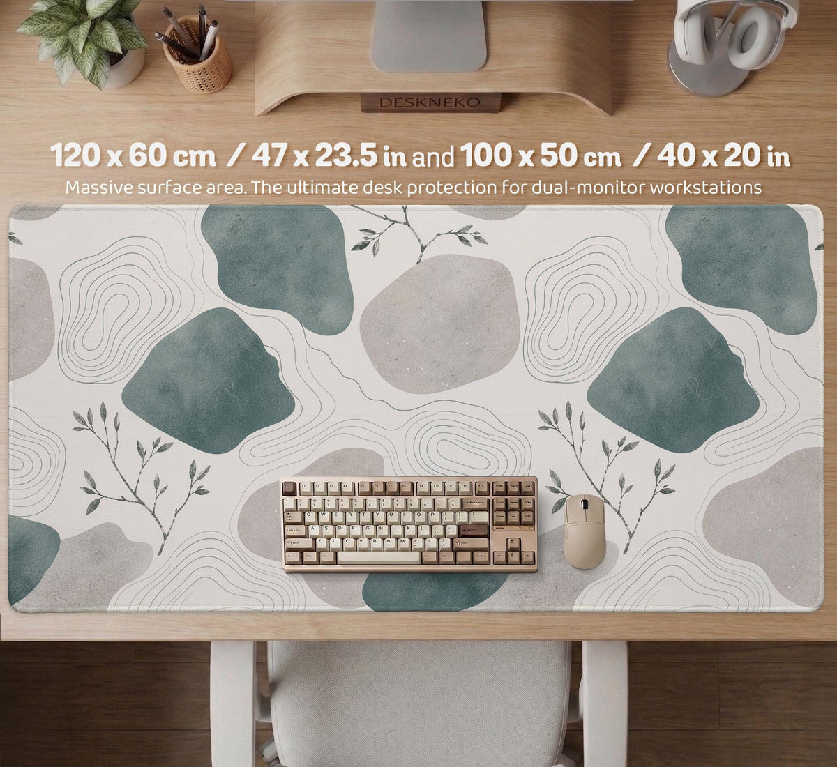 A desk mat with sage green abstract blocks, cream space, gray stone-like shapes, fine topographic contour lines, and small branch details.
