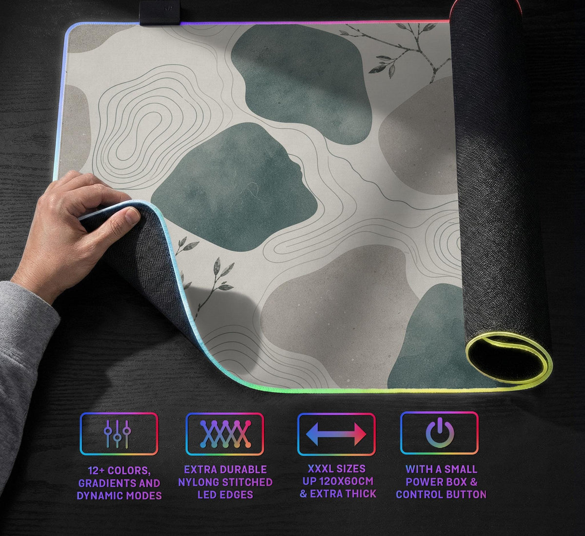 A desk mat with sage green abstract blocks, cream space, gray stone-like shapes, fine topographic contour lines, and small branch details.
