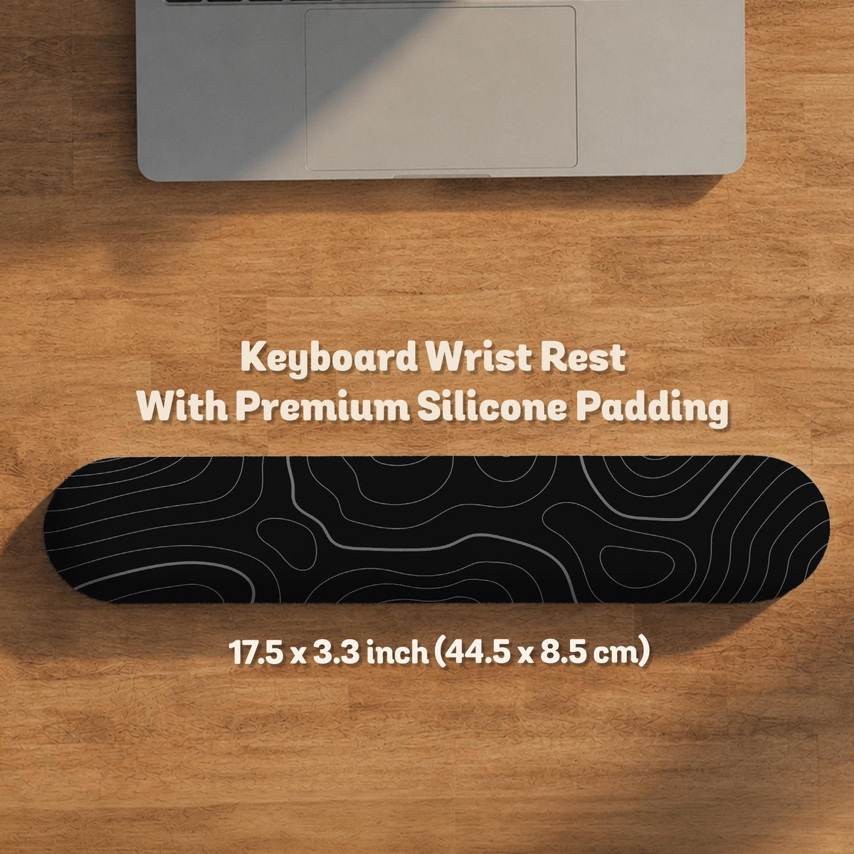Black desk mat with a thin gray topographic contour line pattern.