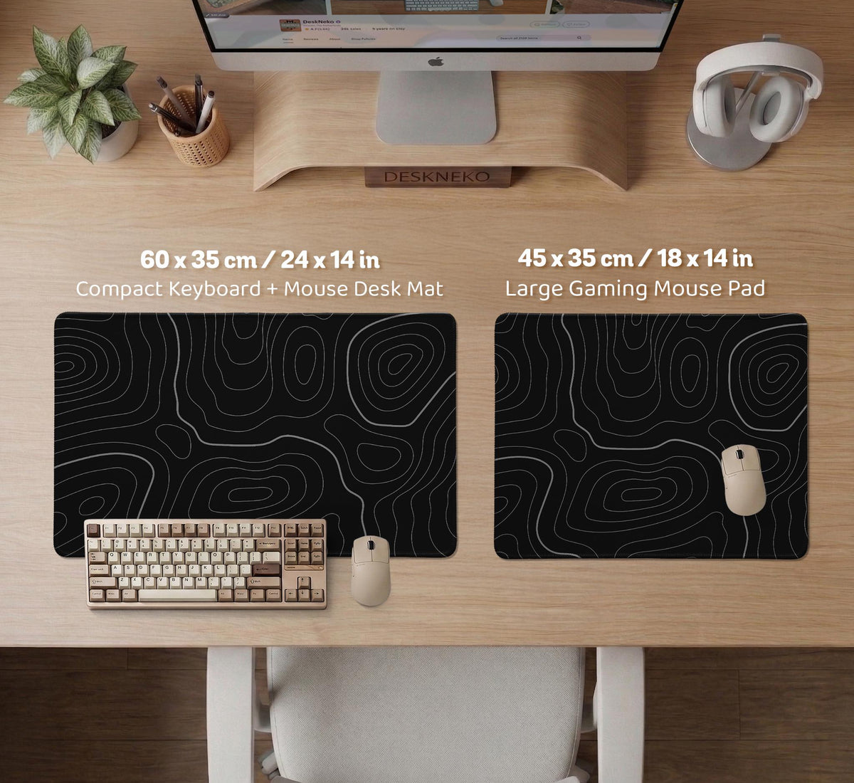 Black desk mat with a thin gray topographic contour line pattern.
