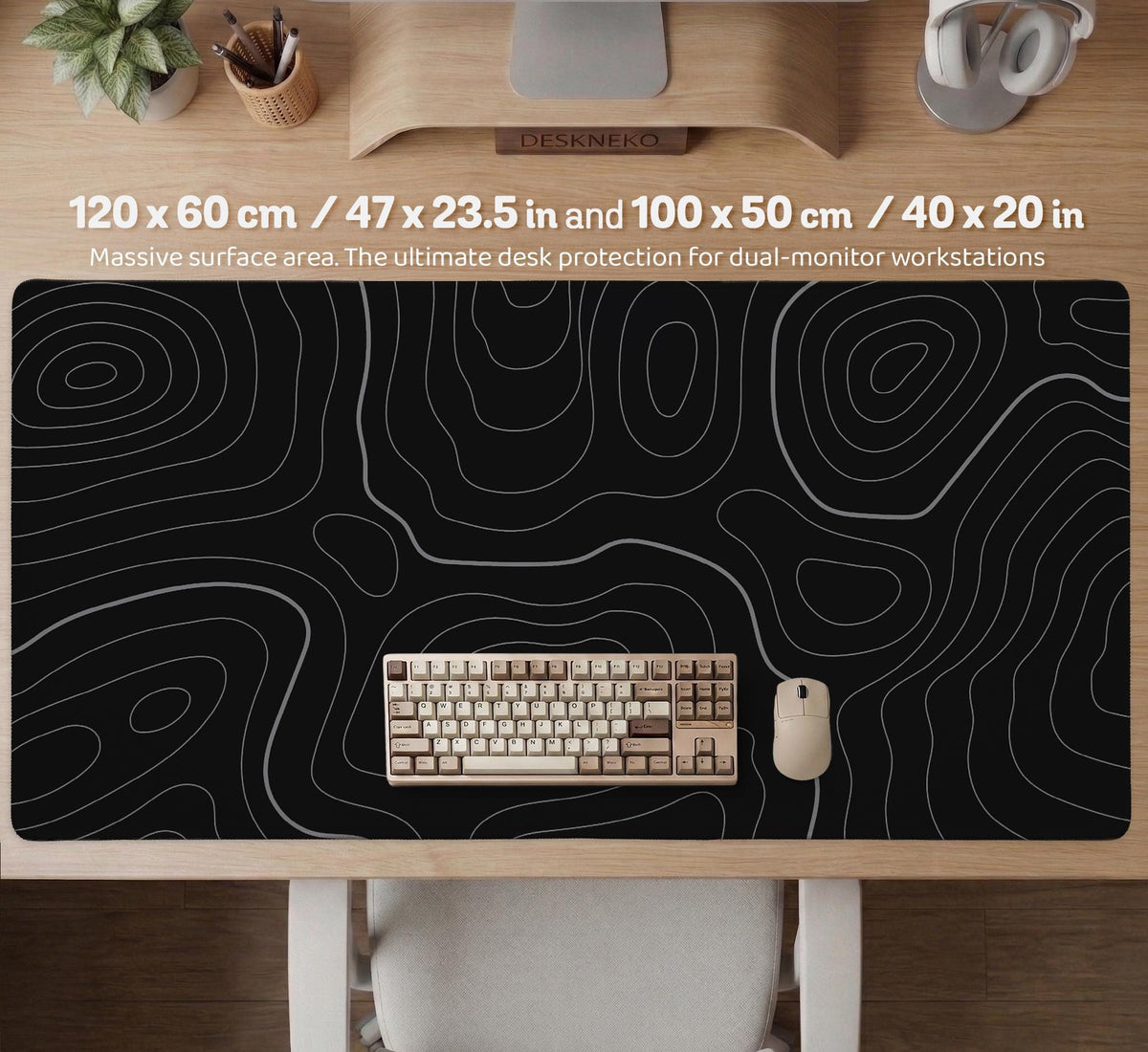 Black desk mat with a thin gray topographic contour line pattern.