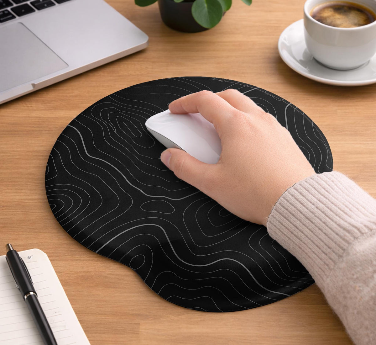 Black mousepad with a gray topographic contour line pattern shown with matching keyboard wrist rest options.