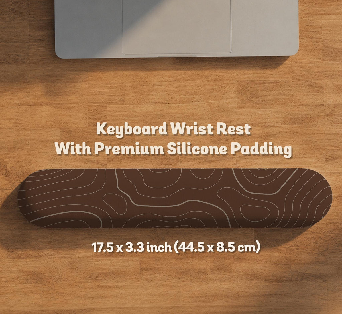 Brown mousepad and keyboard wrist rest with a topographic contour-line pattern.