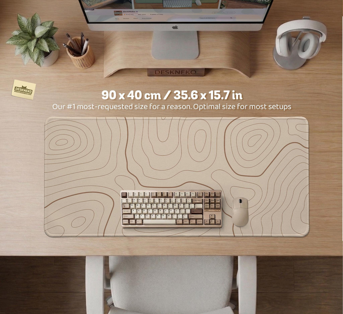 A beige mousepad with a topographic line pattern in a repeating design.
