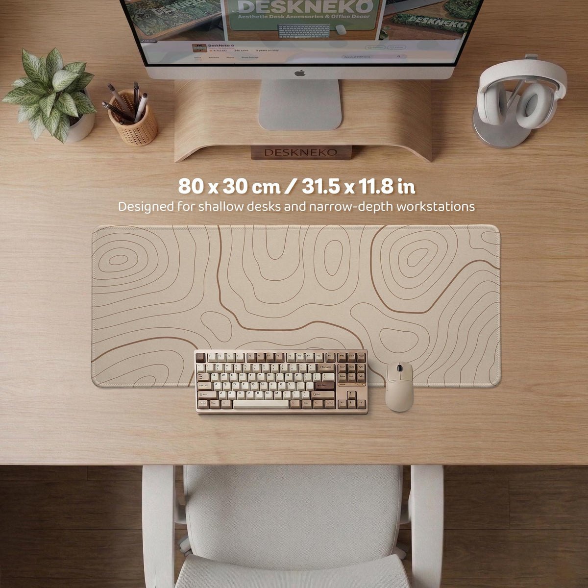 A beige mousepad with a topographic line pattern in a repeating design.